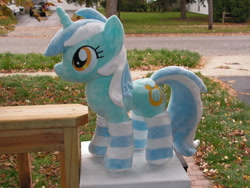 Size: 900x675 | Tagged: safe, artist:karasunezumi, imported from derpibooru, lyra heartstrings, pony, unicorn, clothes, female, irl, mare, photo, plushie, socks, solo, striped socks