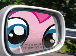 Size: 590x442 | Tagged: safe, artist:necronomiconofgod, artist:ponyweed, edit, imported from derpibooru, part of a set, pinkie pie, automobile, car, close up series, close-up, extreme close up, extreme close-up, fourth wall, fourth wall destruction, irl, mirror, objects in mirror are closer than they appear, parody, photo, rear view mirror, the far side