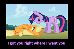 Size: 1632x1080 | Tagged: safe, edit, edited screencap, imported from derpibooru, screencap, applejack, twilight sparkle, earth pony, pony, unicorn, bedroom eyes, caption, female, lesbian, mare, on back, shipping, tongue out, twijack