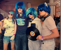 Size: 900x744 | Tagged: safe, artist:caffeinekid11, artist:lauren-campbell, imported from derpibooru, dj pon-3, vinyl scratch, human, b.u.c.k., b.u.c.k. 2012, convention, cosplay, group photo, headphones, irl, irl human, multeity, photo, record, rule 63, wub