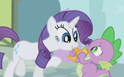 Size: 754x472 | Tagged: safe, imported from derpibooru, screencap, rarity, spike, dragon, pony, unicorn, season 1, the ticket master, eye contact, female, frown, gala ticket, golden ticket, grin, lidded eyes, looking at each other, male, mare, raised hoof, smiling, ticket, tongue out, worried