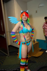 Size: 1365x2048 | Tagged: safe, artist:salaciouseos, imported from derpibooru, rainbow dash, human, belly button, bikini, clothes, cosplay, irl, irl human, megacon, photo, rainbow socks, sexy, socks, solo, striped socks, swimsuit