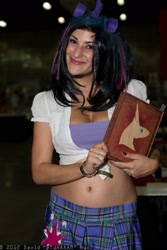 Size: 1365x2048 | Tagged: safe, artist:flirt fillies, imported from derpibooru, twilight sparkle, human, belly, belly button, book, cleavage, comikaze expo, cosplay, female, irl, irl human, photo, solo