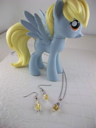 Size: 2748x3664 | Tagged: source needed, safe, imported from derpibooru, derpy hooves, pegasus, pony, earring, female, funko, irl, jewelry, mare, photo, toy