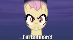 Size: 1268x708 | Tagged: safe, edit, edited screencap, imported from derpibooru, screencap, fluttershy, bat pony, pony, bats!, batman, batmare, caption, fangs, female, flutterbat, flutterbatman, image macro, race swap, solo, text