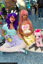Size: 1365x2048 | Tagged: artist needed, safe, imported from derpibooru, fluttershy, rarity, spike, human, build-a-bear, comikaze expo, comikaze expo 2013, cosplay, glasses, irl, irl human, photo, plushie, spike plushie