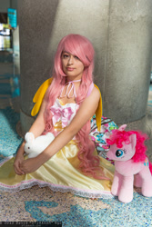 Size: 1365x2048 | Tagged: artist needed, safe, imported from derpibooru, fluttershy, pinkie pie, human, comikaze expo, comikaze expo 2013, convention, cosplay, irl, irl human, photo, plushie