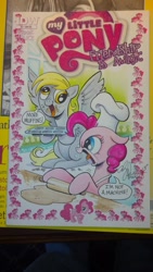 Size: 1024x1816 | Tagged: safe, artist:andypriceart, idw, imported from derpibooru, derpy hooves, pinkie pie, pegasus, pony, angry, baking, comic cover, dough, female, little tongue, mare