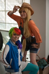 Size: 427x640 | Tagged: safe, artist:grim-tales, imported from derpibooru, applejack, rainbow dash, human, anime expo, anime expo 2012, cosplay, irl, irl human, photo
