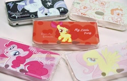 Size: 600x384 | Tagged: safe, imported from derpibooru, apple bloom, applejack, fluttershy, pinkie pie, twilight sparkle, 3ds, case, cover, japanese, merchandise