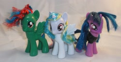 Size: 3545x1809 | Tagged: safe, artist:gryphyn-bloodheart, imported from derpibooru, oc, oc only, oc:elixir dawn, oc:emerald sketch, oc:ocean skye, alicorn, pegasus, pony, unicorn, alicorn oc, brushable, custom, customized toy, irl, photo, toy