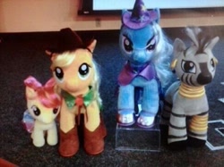 Size: 486x364 | Tagged: safe, imported from derpibooru, apple bloom, applejack, trixie, zecora, zebra, build-a-bear, irl, official, photo, plushie