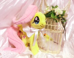 Size: 751x591 | Tagged: safe, imported from derpibooru, fluttershy, bird, pegasus, pony, asklolitashy, bow, cage, female, flower, mare, plushie, solo