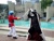 Size: 1024x768 | Tagged: artist needed, safe, artist:wrathofconpics, imported from derpibooru, king sombra, shining armor, human, 2013, convention, cosplay, day, fight, irl, irl human, master sword, otakon, photo, sword, the legend of zelda