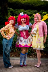 Size: 683x1024 | Tagged: safe, artist:bewitchedraven, artist:wonderwomanscosplay, artist:zoeysecho, imported from derpibooru, apple bloom, fluttershy, pinkie pie, human, 2013, anime weekend atlanta, clothes, corset, cosplay, dress, gala dress, irl, irl human, overalls, photo, plushie