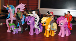 Size: 1200x648 | Tagged: safe, imported from derpibooru, applejack, pinkie pie, princess celestia, spike, twilight sparkle, flint, g.i. joe, humans riding ponies, merchandise, riding, roadblock, scarlett, storm shadow, toy pony cavalry