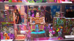 Size: 1600x900 | Tagged: safe, imported from derpibooru, cheerilee, pinkie pie, rainbow dash, rarity, twilight sparkle, zecora, alicorn, pony, zebra, female, irl, mare, merchandise, my little pony pop!, official, photo, san diego comic con, sdcc 2014, sprue pony, sugarcube corner, twilight sparkle (alicorn)