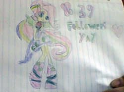 Size: 416x309 | Tagged: safe, imported from derpibooru, fluttershy, equestria girls, rainbow rocks, 39 followers, female, heart, humanized, lined paper, photo, ponied up, solo, traditional art, winged humanization, yay