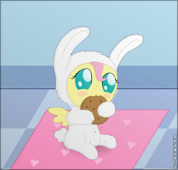 Size: 600x574 | Tagged: dead source, safe, artist:skunk412, imported from derpibooru, fluttershy, pony, baby, baby pony, babyshy, bunny costume, bunnyshy, clothes, cookie, cute, eating, female, foal, nibbling, shyabetes, sitting, solo, weapons-grade cute, younger