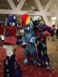 Size: 1536x2048 | Tagged: safe, imported from derpibooru, rainbow dash, bronycon, cosplay, irl, matrix of leadership, optimus prime, photo, transformers