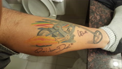 Size: 5312x2988 | Tagged: safe, imported from derpibooru, rainbow dash, human, ashleigh ball, bathroom, irl, irl human, photo, signature, tattoo