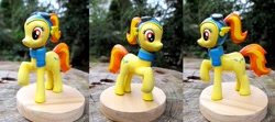 Size: 1024x454 | Tagged: safe, artist:daisymane, imported from derpibooru, oc, oc only, goggles, photo, raised hoof, sculpture, solo, traditional art, wonderbolts, wonderbolts uniform