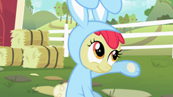 Size: 1366x768 | Tagged: safe, imported from derpibooru, screencap, apple bloom, earth pony, pony, family appreciation day, adorabloom, bunny bloom, bunny costume, clothes, cute, female, filly, raised hoof, smiling, solo