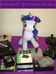 Size: 1749x2332 | Tagged: artist needed, safe, imported from derpibooru, twilight sparkle, arcade stick, atari 2600, game boy advance, game boy color, gamecube, horn ring, irl, jin, logic 3, logic3, nintendo entertainment system, photo, playstation, plushie, sega genesis