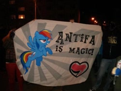 Size: 450x337 | Tagged: safe, imported from derpibooru, rainbow dash, anarchism, antifa, irl, leftism, mouthpiece, photo, politics, politics in the comments, why sid why