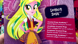 Size: 1366x768 | Tagged: safe, imported from derpibooru, lemon zest, equestria girls, friendship games, box art, clothes, crystal prep academy, crystal prep shadowbolts, doll, english, female, french, school spirit, skirt, solo, spanish, text