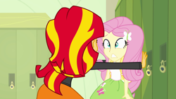 Size: 640x360 | Tagged: safe, imported from derpibooru, screencap, fluttershy, sunset shimmer, equestria girls, equestria girls (movie), female, kabedon