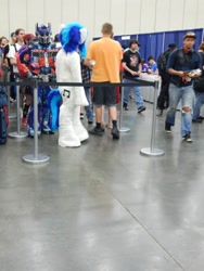 Size: 720x960 | Tagged: safe, artist:atalonthedeer, imported from derpibooru, dj pon-3, vinyl scratch, human, bronycon, bronycon 2015, clothes, cosplay, costume, fursuit, irl, irl human, optimus prime, photo, transformers