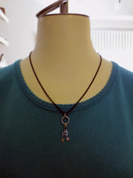 Size: 3400x4533 | Tagged: safe, artist:lyraalluse, imported from derpibooru, dj pon-3, vinyl scratch, craft, irl, jewelry, metal, necklace, no pony, pendant, photo