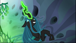 Size: 1024x576 | Tagged: safe, imported from derpibooru, screencap, queen chrysalis, changeling, changeling queen, to where and back again, cocoon, evil grin, female, glowing eyes, glowing horn, grin, rearing, smiling, solo