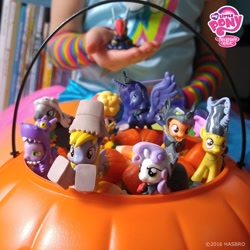Size: 1080x1080 | Tagged: safe, imported from derpibooru, apple bloom, derpy hooves, princess luna, rainbow dash, scootaloo, spike, sweetie belle, zecora, human, zebra, alternate hairstyle, blind bag, clothes, costume, cutie mark crusaders, irl, irl human, my little pony logo, nightmare night, nightmare night costume, official, photo, pumpkin bucket, toy