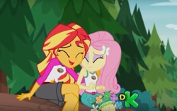 Size: 991x619 | Tagged: safe, imported from derpibooru, screencap, fluttershy, sunset shimmer, equestria girls, legend of everfree, cute, discovery kids, female, out of context, shimmerbetes, shyabetes