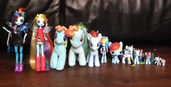 Size: 3033x1541 | Tagged: safe, artist:ziatimetwist, imported from derpibooru, rainbow dash, equestria girls, rainbow rocks, aurora, blind bag, brushable, doll, equestria girls minis, fashion style, figure, funko, irl, keychain, mcdonald's happy meal toys, multeity, official, photo, plushie, size comparison, toy, ty