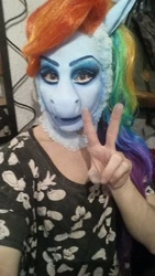 Size: 405x720 | Tagged: safe, artist:phi phi o'hara, imported from derpibooru, rainbow dash, human, abomination, clothes, cosplay, costume, irl, irl human, makeup, nightmare fuel, photo, uncanny valley, wat, what has science done