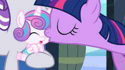 Size: 1779x1001 | Tagged: safe, imported from derpibooru, screencap, princess flurry heart, twilight sparkle, twilight velvet, alicorn, pony, unicorn, the crystalling, aunt and niece, auntie twilight, baby, baby flurry heart, baby pony, cheek kiss, cute, cute baby, diabetes, diaper, diapered, diapered filly, female, filly, flurrybetes, grandmother and grandchild, happy, happy baby, holding a baby, holding a pony, infant, infant flurry heart, kiss on the cheek, kissing, kissy-kiss, light pink diaper, mare, newborn, newborn baby, newborn baby flurry heart, newborn filly, newborn flurry heart, newborn infant flurry heart, platonic kiss, smiling, twiabetes, twilight sparkle (alicorn), weapons-grade cute