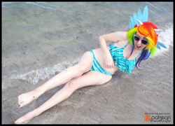 Size: 2000x1438 | Tagged: safe, artist:krazykari, imported from derpibooru, rainbow dash, human, barefoot, beach, bikini, clothes, cosplay, costume, feet, irl, irl human, photo, solo, swimsuit, wave