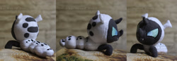 Size: 1927x667 | Tagged: safe, artist:nakedskull, imported from derpibooru, changeling, changeling larva, the times they are a changeling, irl, photo, plushie, watermark