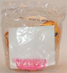 Size: 472x510 | Tagged: safe, imported from derpibooru, butterscotch (g1), bag, comb, g1, irl, photo, ribbon, solo, toy