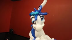 Size: 960x539 | Tagged: safe, artist:noordinaryballoonman, imported from derpibooru, shining armor, balloon, balloon animal, derp, irl, photo