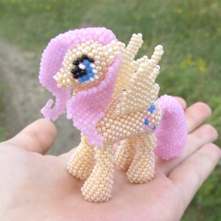 Size: 1500x1500 | Tagged: safe, artist:some-dreamer, imported from derpibooru, fluttershy, beads, hand, irl, offscreen human, photo
