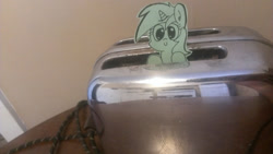 Size: 1280x722 | Tagged: safe, artist:davierocket, imported from derpibooru, lyra heartstrings, pony, unicorn, craft, irl, papercraft, photo, ponies in real life, smiling, solo, tiny ponies, toaster