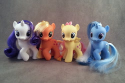 Size: 1024x685 | Tagged: safe, imported from derpibooru, applejack, fluttershy, rarity, trixie, female, irl, photo, toy