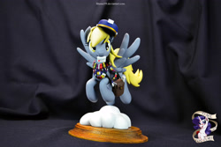 Size: 4608x3072 | Tagged: safe, artist:shuxer59, imported from derpibooru, derpy hooves, pegasus, pony, clothes, female, figurine, flying, fourth doctor's scarf, mail, mailmare, mare, photo, saddle bag, scarf, sculpture, solo, striped scarf, traditional art, underp
