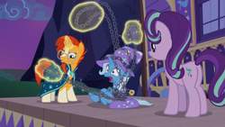 Size: 1920x1080 | Tagged: safe, imported from derpibooru, screencap, starlight glimmer, sunburst, trixie, uncommon bond, bondage, butt, cape, caravan, chains, clothes, epic fail, fail, hat, kidnapped, out of context, plot, struggling, trixie's cape, trixie's hat, trixie's wagon, wagon