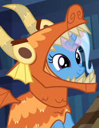 Size: 578x746 | Tagged: safe, imported from derpibooru, screencap, trixie, dragon, pony, unicorn, uncommon bond, adorable face, best dragon, board game, clothes, costume, cropped, cute, daaaaaaaaaaaw, diatrixes, dragon costume, dragon pit, female, glowing horn, hnnng, mare, smiling, solo