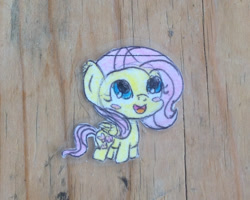 Size: 1280x1024 | Tagged: safe, artist:ladyeleanork, imported from derpibooru, fluttershy, pegasus, pony, blush sticker, blushing, chibi, cropped, folded wings, irl, looking up, open mouth, photo, smiling, solo, traditional art, wings
